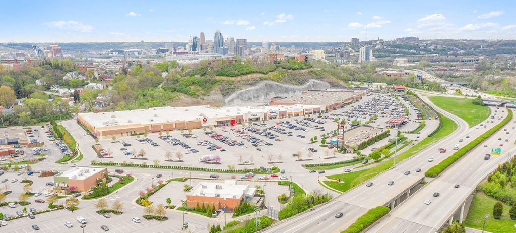 Aerial of Newport Pavilion power center with the Cincinnati skyline beyond