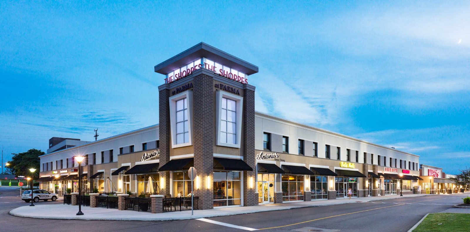 The Shoppes at Parma retail frontage at dusk